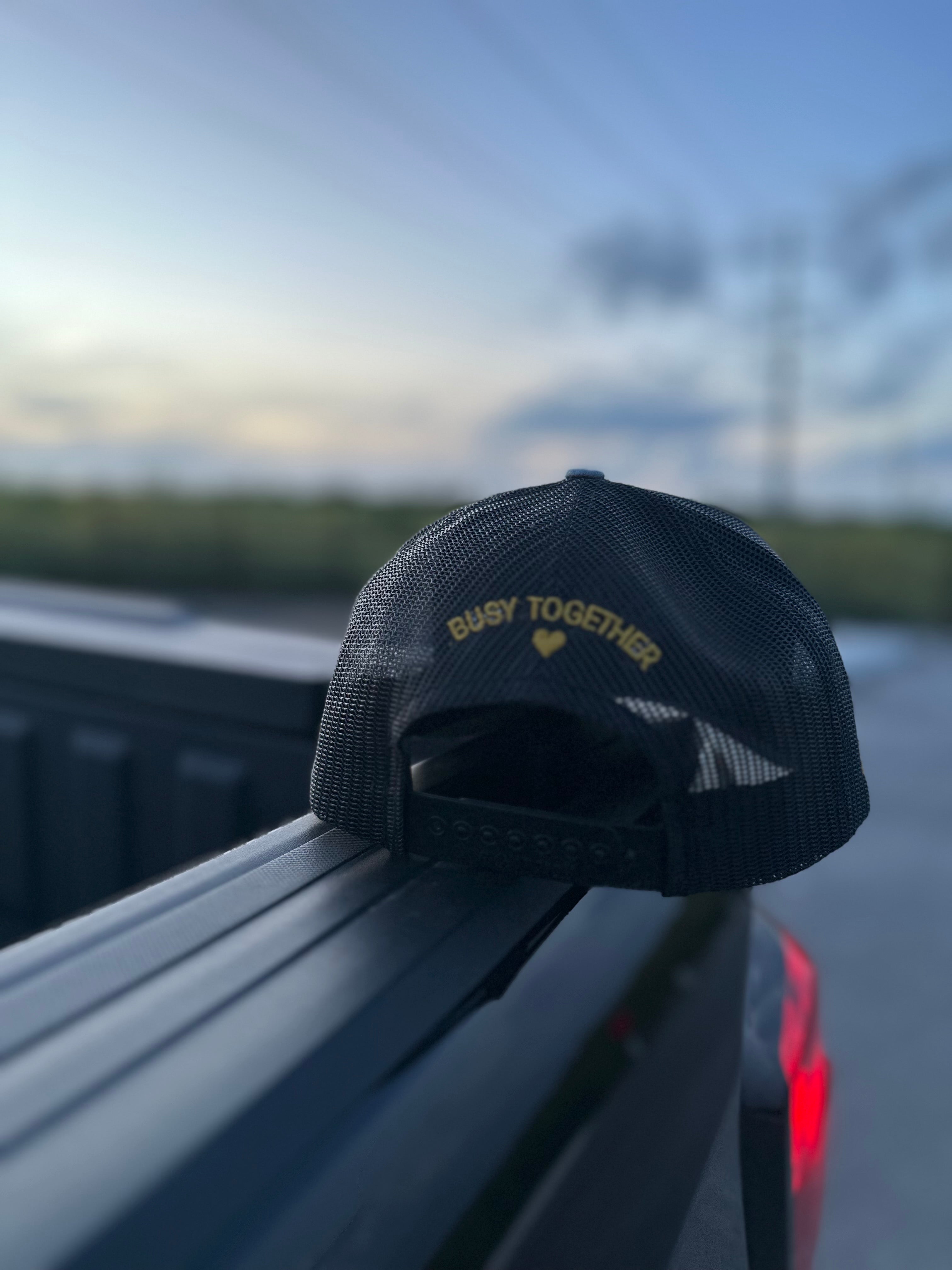 Busy Together Trucker Hat